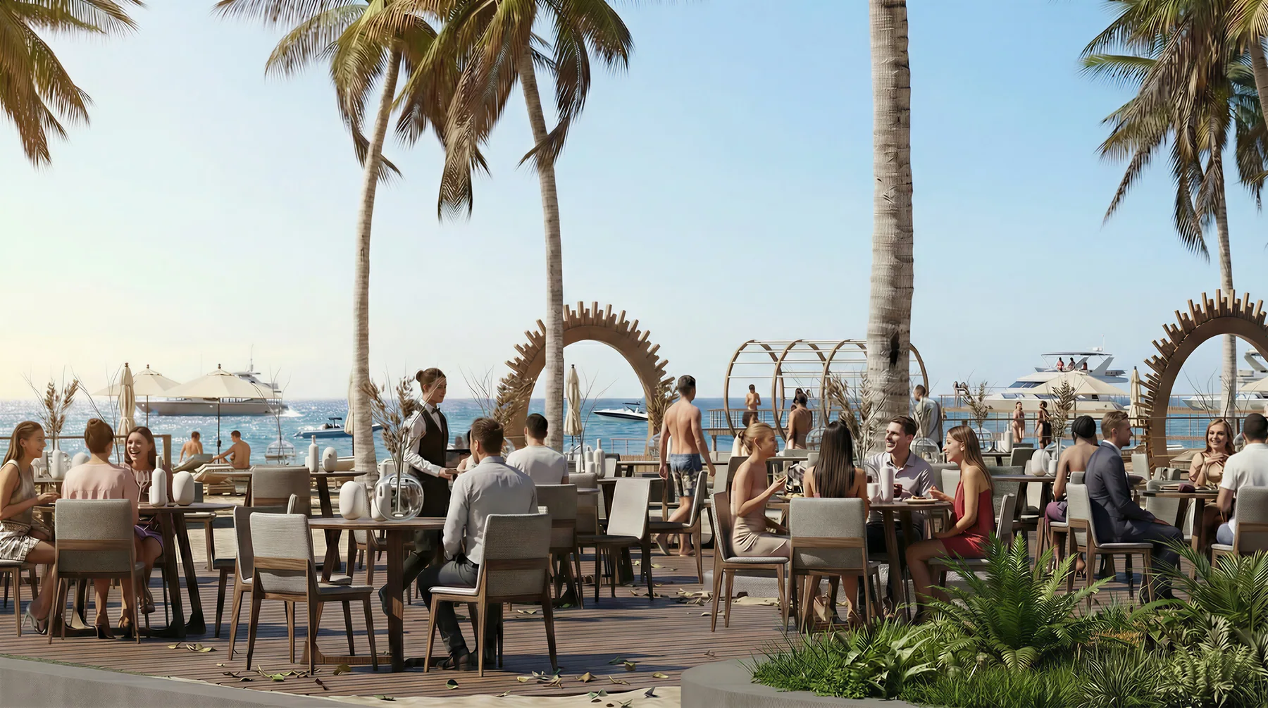 The beach restaurant under the arched screen, the marina beyond