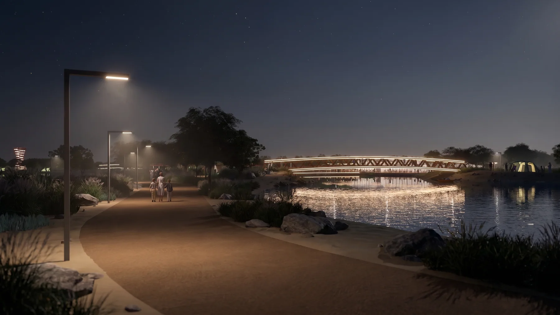 The lit path along the shore
